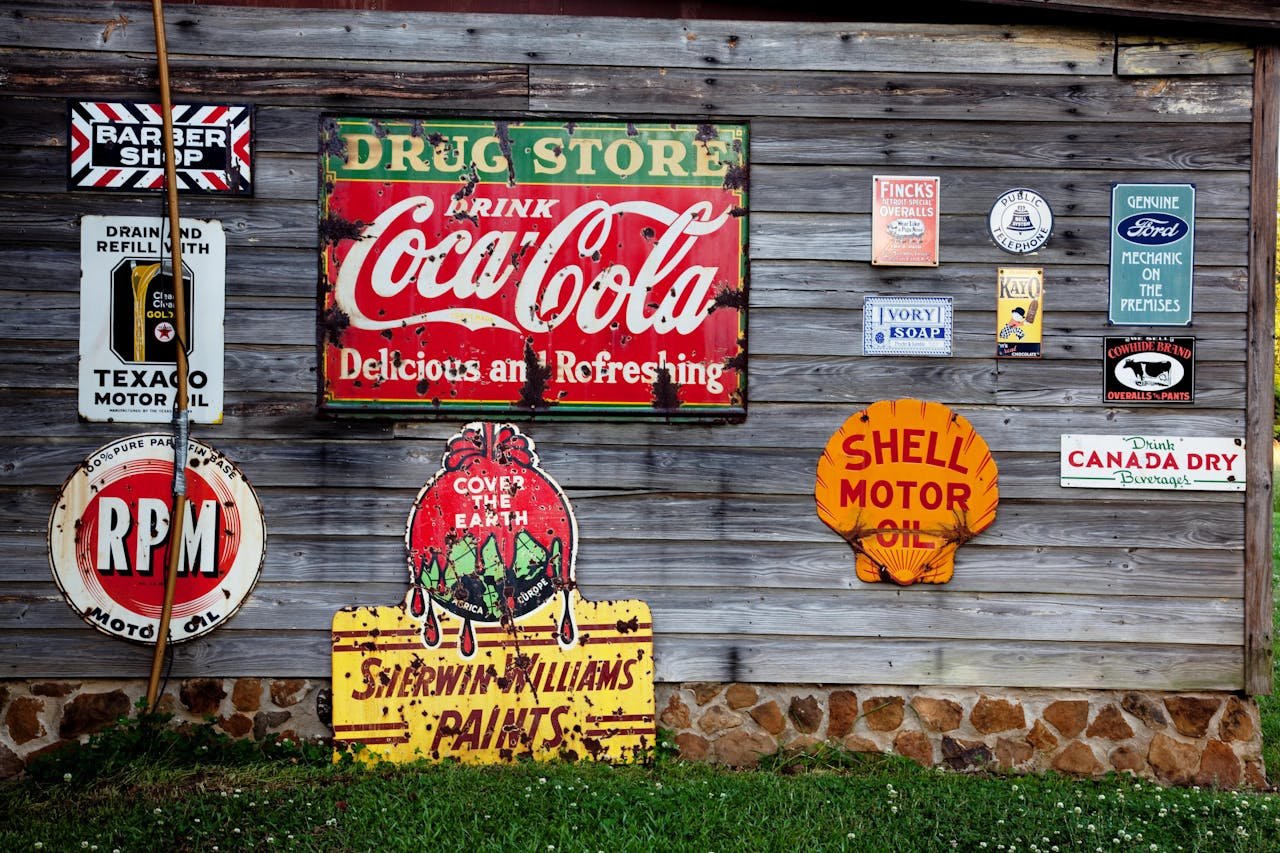 Drug Store Drink Coca Cola Signage On Gray Wooden Wall 210126